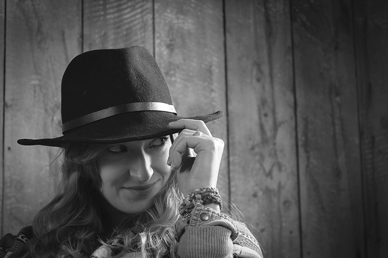 Cowgirl with a mischeivous gleam in her eye